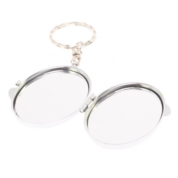 Складное зеркало брелок из флюорита овальное 126644
